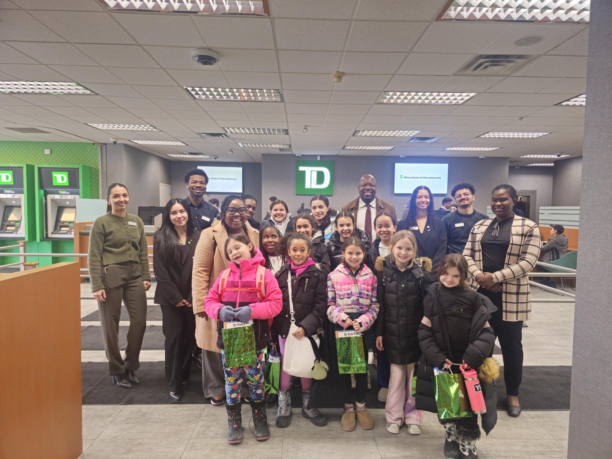 Girls from The Wealth Table camp in downtown Toronto's Financial District